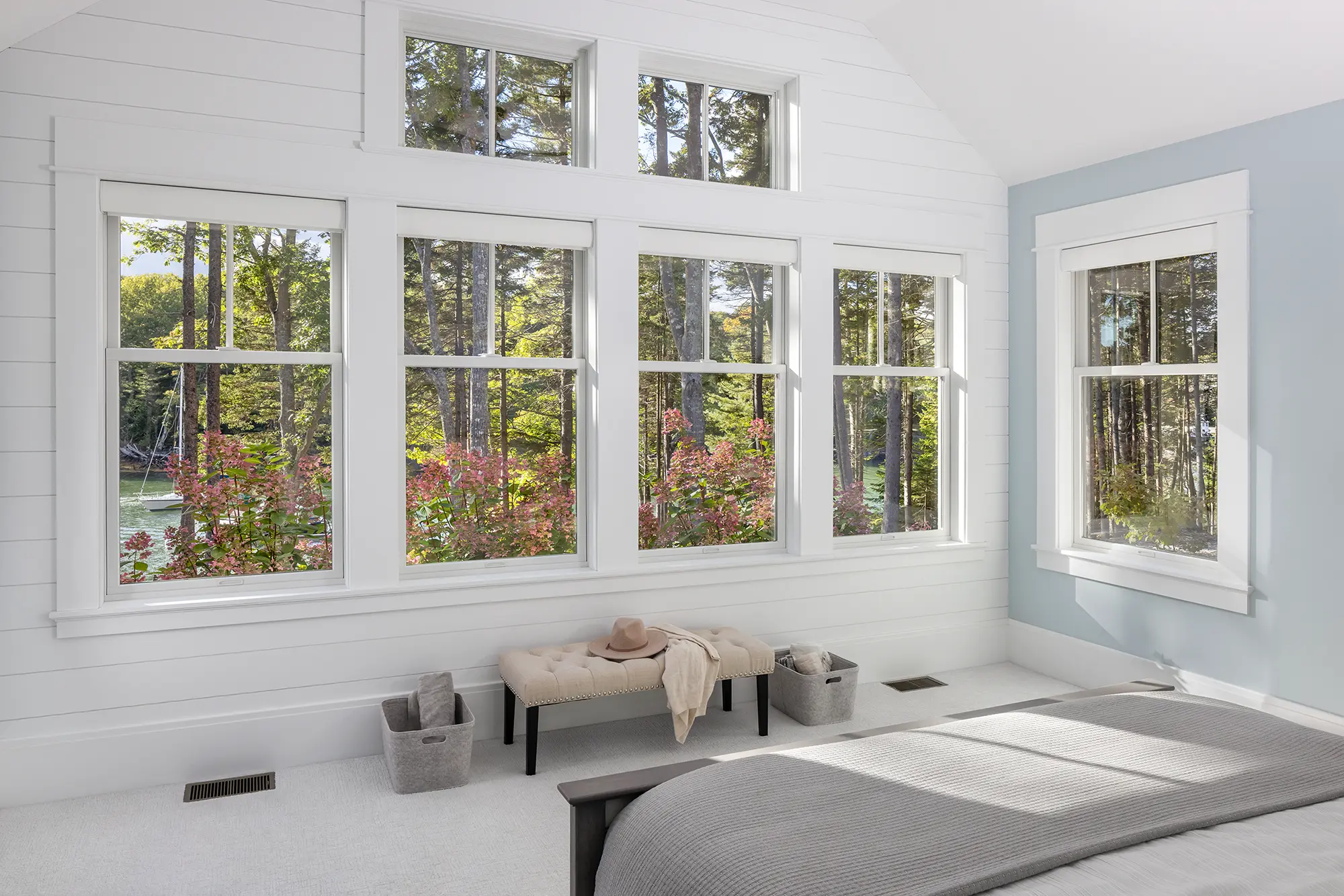 White windows in a bedroom