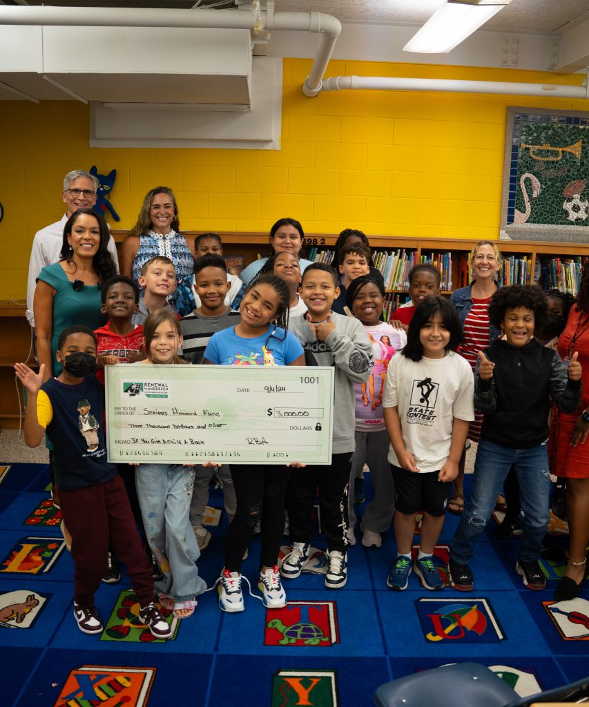 Group of children with a Renewal by Andersen check