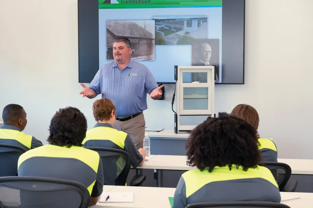 Renewal by Andersen employee presenting to other employees