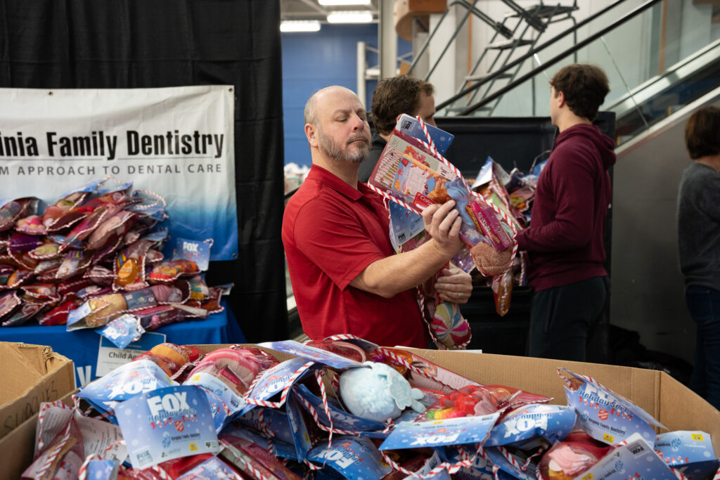 Renewal by Andersen volunteers for Fox Holiday Socks in Richmond, VA