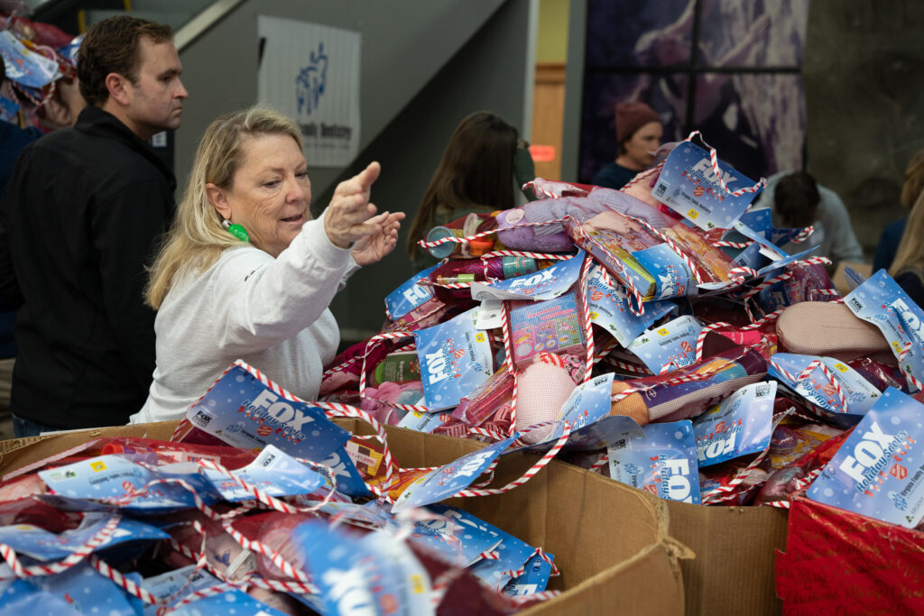 Renewal by Andersen volunteers for Fox Holiday Socks in Richmond, VA