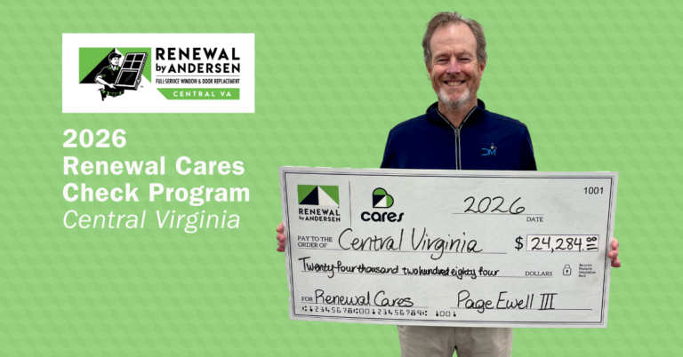 Page Ewell with giant check