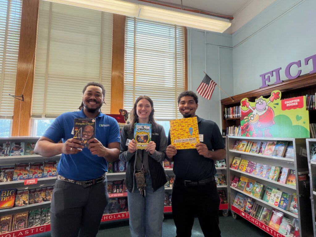 Renewal by Andersen team members volunteering at Frances W McClenney Elementary School, as part of the If You Give A Child A Book program
