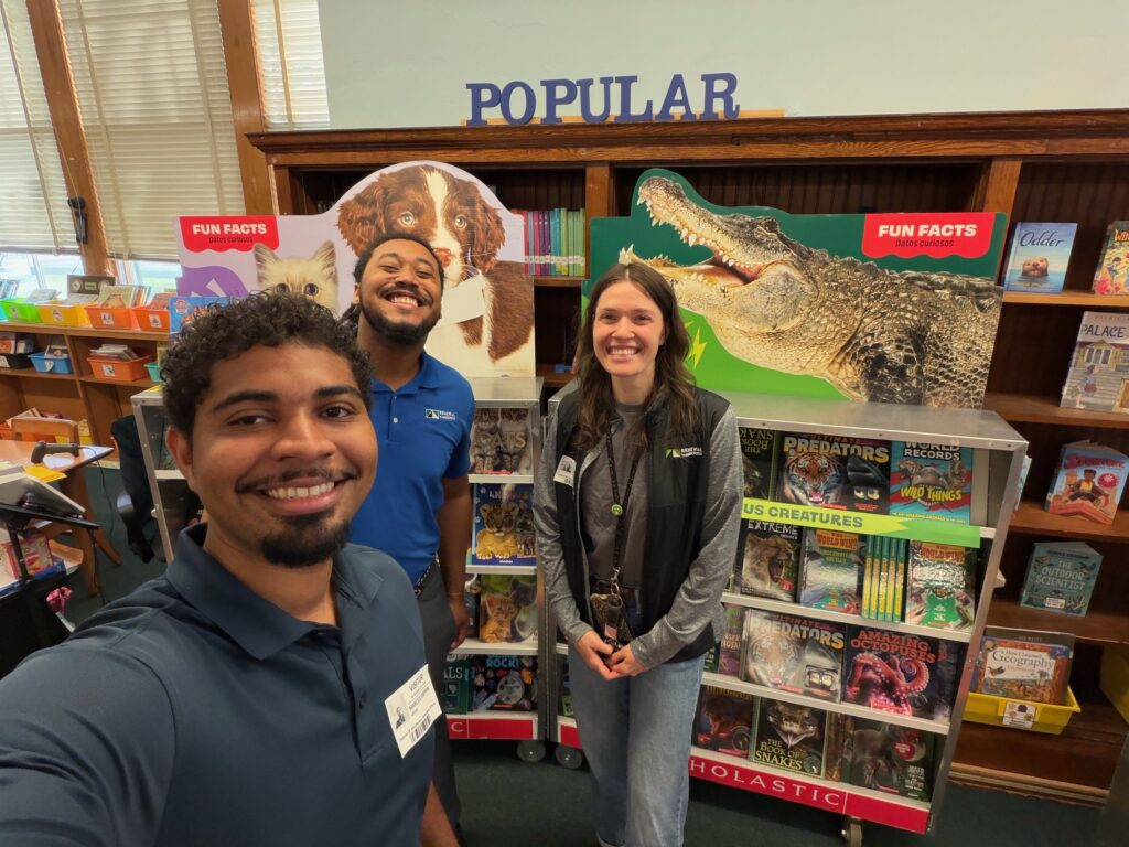Renewal by Andersen team members volunteering at Frances W McClenney Elementary School, as part of the If You Give A Child A Book program