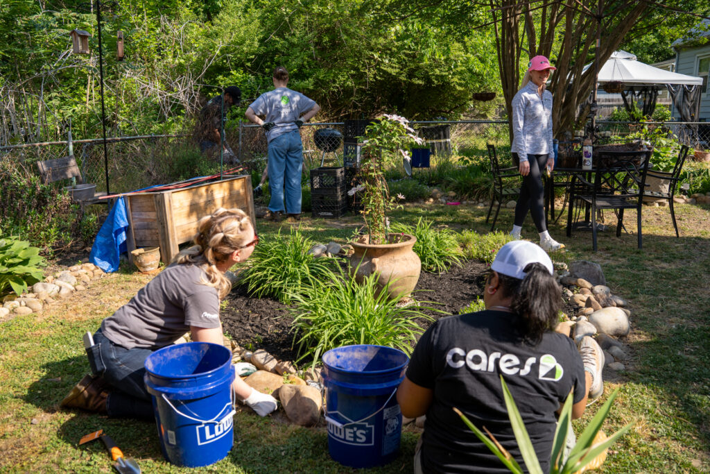 Renewal Cares team working on the property
