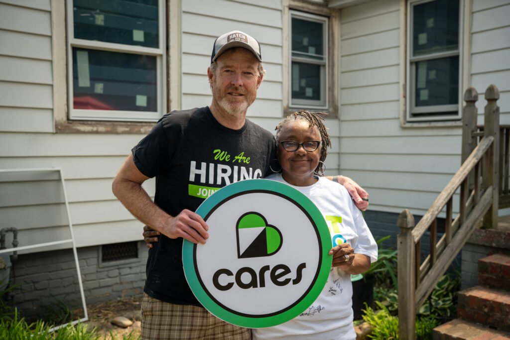 Owner of Renewal by Andersen, Page Ewell III, with homeowner Nikka