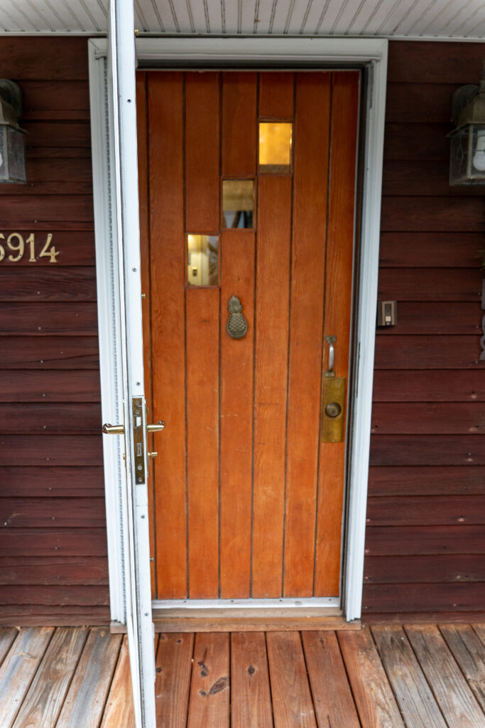 Outside view of the original door on the 1930s Cape Cod cottage in Roanoke, VA