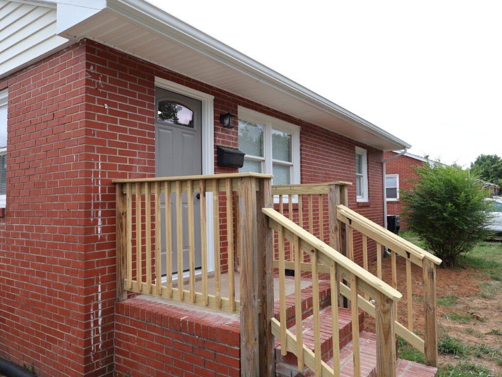 Renewal by Andersen installed front entry door on Fredericksburg Habitat home.