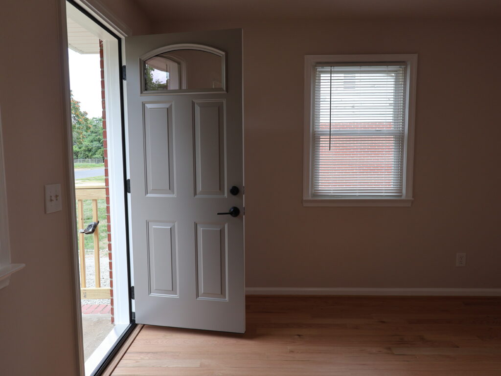 New replacement door opening from the inside of the habitat home.