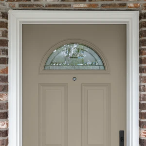Tan entry door with half circle window