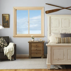 Wooden gliding windows in a bedroom