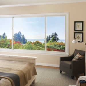 White gliding windows in a bedroom