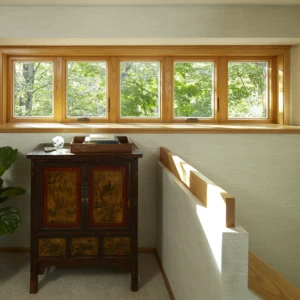 Ribbon window above chair and stairs