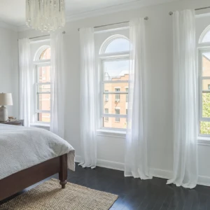 White double hung windows in a bedroom