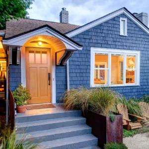 Blue house with white double hung windows
